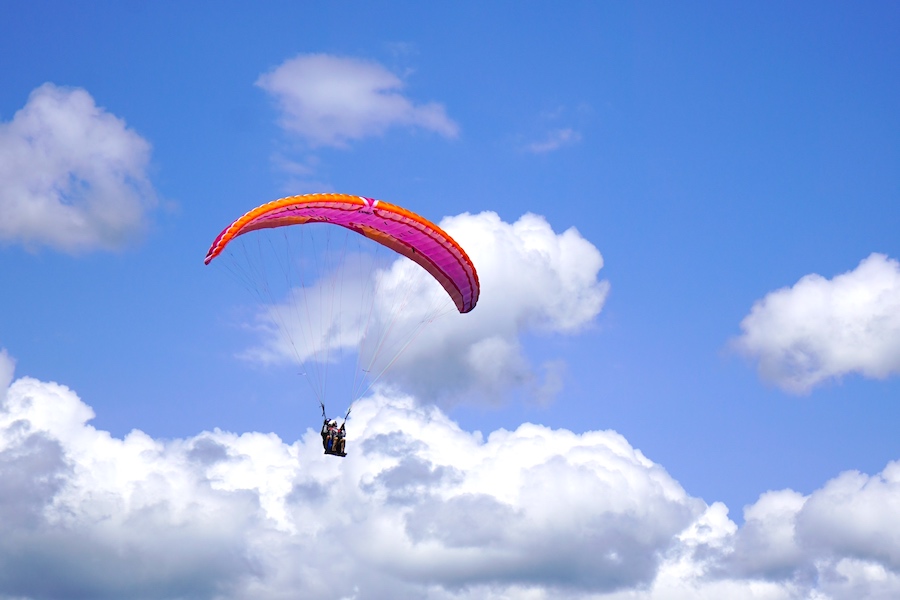 windforce 32 wich is flying in the sky is a tandem paraglider wing made by levelwings